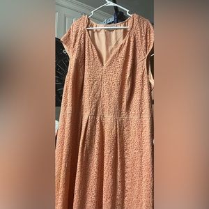 Pink lace like fabric dress